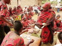 WOCCU's new program will help strengthen Tanzania's credit unions to bring safe and sound services to communities that only have access to informal savings and loan groups, such as the one pictured above.
