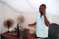 Working inside a tent office after Haiti earthquake