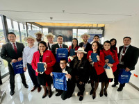 Vystar participants exchanging gifts with the study tour host