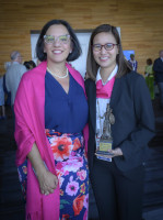 Eleni Giakoumopoulus presents Ida Rosette Ocampo with the 2023 Athena Award