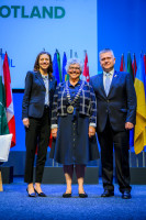 WOCCU Board Chair Diana Dykstra (center), with outgoing Chair Rafal Matusiak and President and CEO Elissa McCarter LaBorde