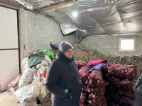 Olga Dovganyk with her harvested crops