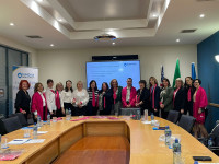 The women of Dundalk Credit Union and PVKS Credit Union sporting Pink Items from GWLN.