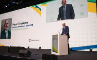 Treinen speaking at the 2025 World Credit Union Conference