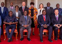 President William Ruto (bottom far left), with Elissa McCarter LaBorde (top right) and other credit union leaders