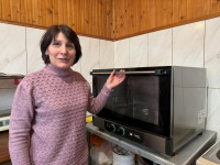 Iryna Solian with her new pizza oven